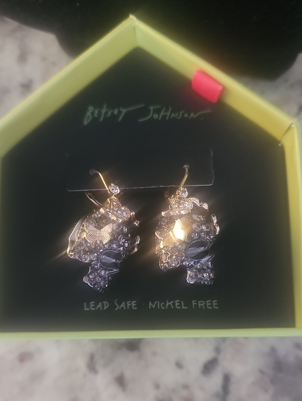 Betsey Johnson Gold and Silver Skull Drop Earrings with Crystal Accents